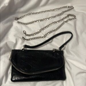 HOBO Black and Silver Clutch with Elegant Design